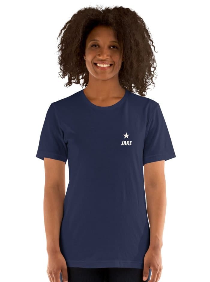 A navy t-shirt with a star emblem and a name printed on the left chest